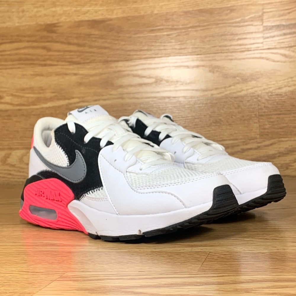 Nike Women size 7 hot pink,gray,black,and white